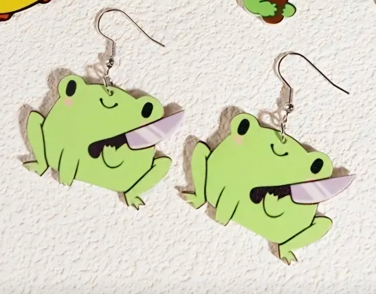 Acrylic Cartoon Frog Sitting With Knife Design Dangle Earrings